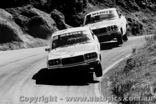 73707  -  Mollison / Hindhough & Perry / Reed  -  Bathurst 1973 - Mazda RX3 s Two  Wheeling through the dipper