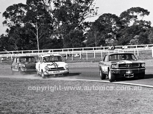 66211 - Bryan Thomson's Mustang ahead of Spencer Martin in Bob Jane's Lotus Cortina at Warwick Farm in 1966. - Photographer Lance J Ruting