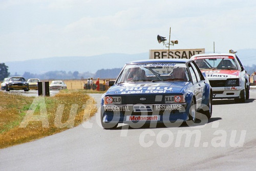 82145 - Dick Johnson, Falcon XD & Peter Brock, Commodore VH - Symmons Plains 7th March 1982  - Photographer  Keith Midgley