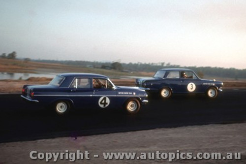 64042 - Norm Beechey Holden  EH S4  / Jim McKeown Lotus Cortina -  Lakeside  1964 - Photographer John Stanley