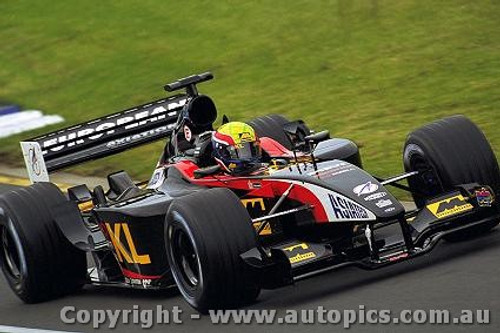 202511 - Mark Webber - Minardi - Australian Grand Prix 2002