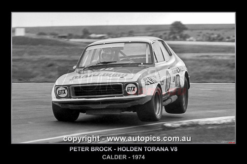 74029-F - Peter Brock, Holden Torana V8 - Calder Park Raceway, 1974 - Printed with a black border and a caption describing the photo.