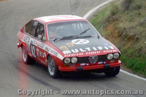 80829  - W. Henderson / G. Harrison Alfetta GTV 2000 -  21st Outright -  Bathurst 1980 - Photographer Lance J Ruting   Slightly out of focus and a mark on the neg