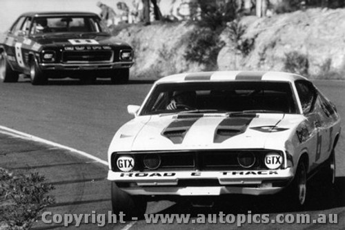 74116 - Allan Moffat in Fred Gibson's  Falcon XA - R Dickson Monaro GTS - Amaroo - 1974 - Photographer Lance J Ruting