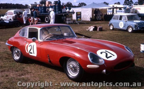 63409 - Bob Jane s E Type Jaguar - John French s Morris Cooper in the back ground - Warwick Farm 1963 - Photographer Adrien Schagen