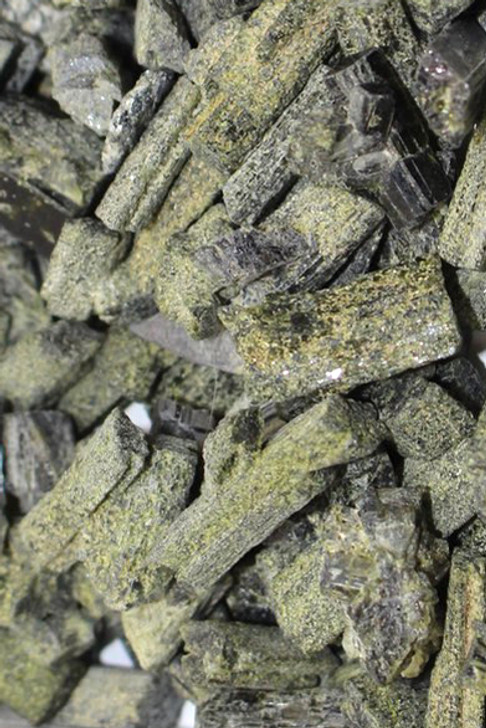 Epidote

Lore: A catalyst for major changes through clearing of self-imposed obstacles, release of negativity, embracing positive patterns, attraction of what emanates.