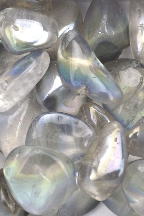 Aura Quartz 
man made
Lore: Lightens and invigorates entire aura, seals holes or leaks in energy field, lessons from past incarnations, the nervous system, anxiety, panic attacks, excellent for energy healing.