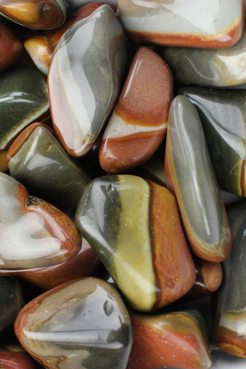 Polychrome Jasper  

Lore: Brings new beginnings, excellent for sharing over, happy outlook on life, allergies, communication with nature.