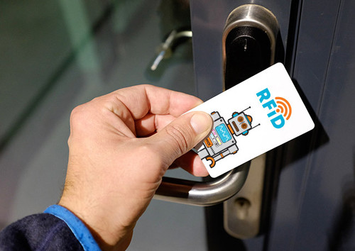 Custom RFID key card used for hotel door access control — contactless printed plastic card with embedded RFID chip, hotel key card and security badge solution, made in USA