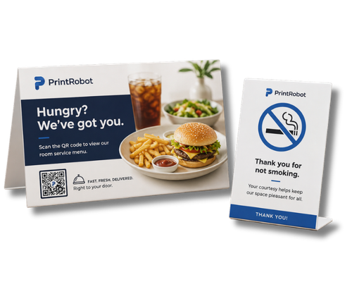 Custom printed plastic table tents displayed on restaurant table — full color PVC table top signs with QR code for menus and promotions, hotels and dining use, made in USA
