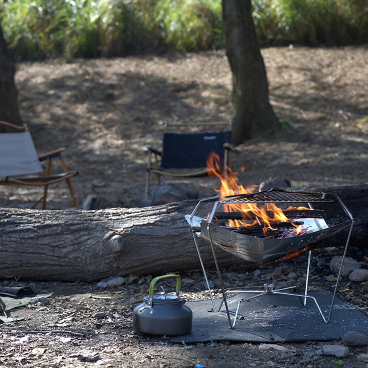 Portable clearance backpacking grill