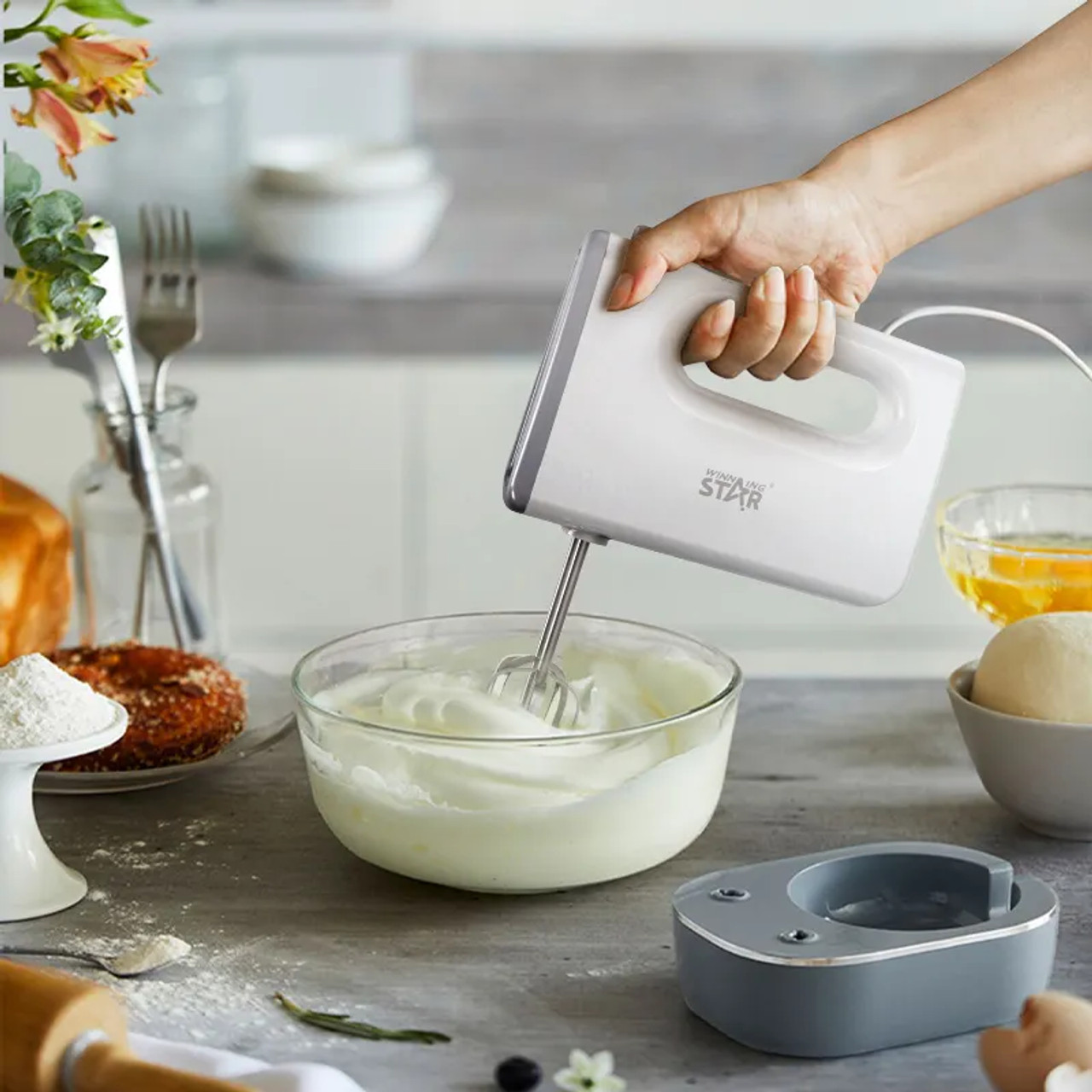 Knead dough with hand clearance mixer