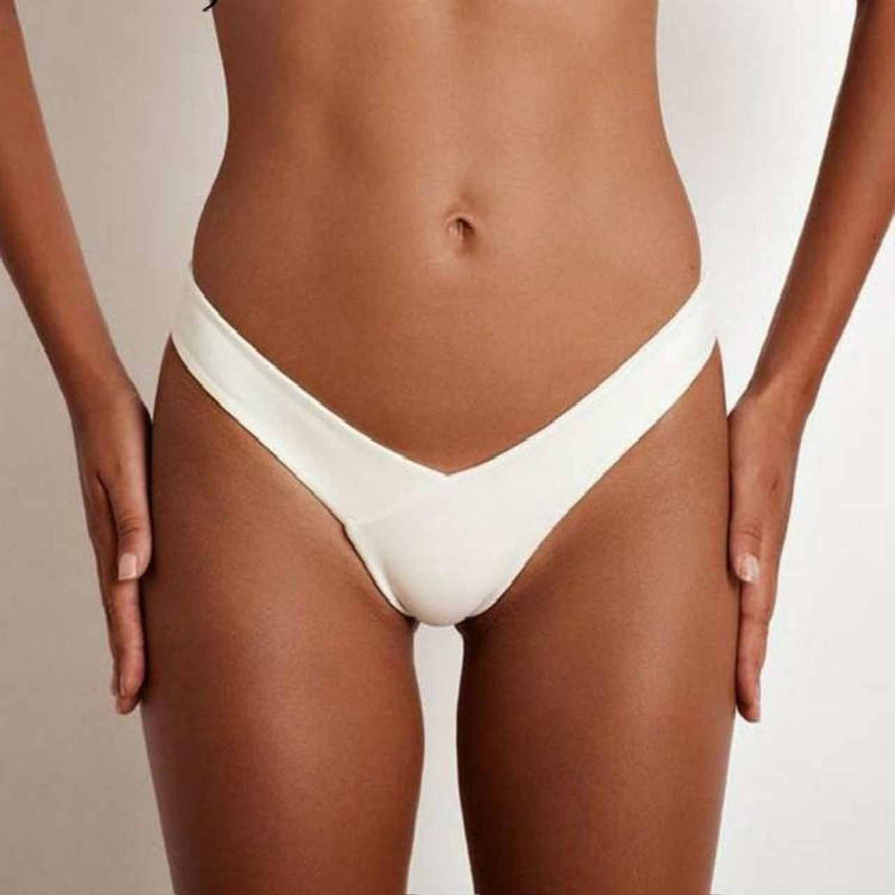 Premium Photo  White woman underwear shorts on hips. girl's cotton panties  bottom. white thongs. woman health diet