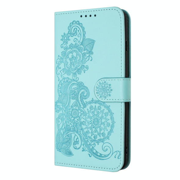 For Google Pixel 7 Datura Flower Embossed Flip Leatherette Phone Case(Light blue)
