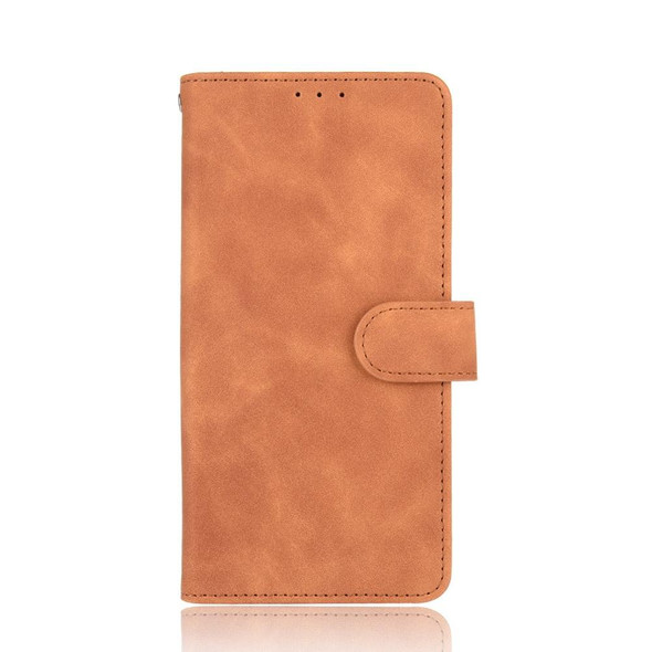 Solid Color Skin Feel Magnetic Buckle Horizontal Flip Calf Texture PU Leather Case with Holder & Card Slots & Wallet - iPhone 13 Pro(Brown)