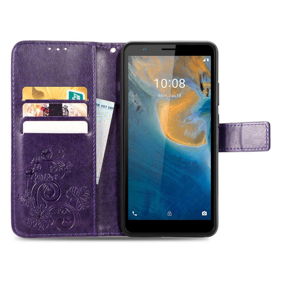 ZTE Blade A31 Four-leaf Clasp Embossed Buckle Mobile Phone Leather Case(Purple)