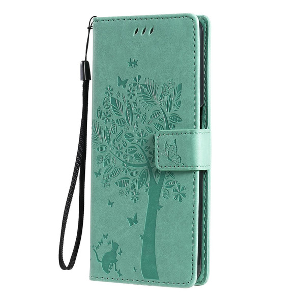 OPPO Realme 7 Tree & Cat Pattern Pressed Printing Horizontal Flip PU Leather Case with Holder & Card Slots & Wallet & Lanyard(Green)