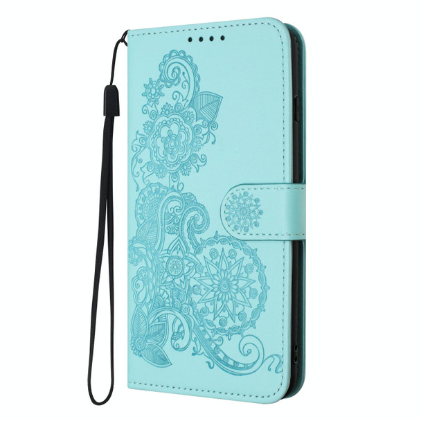 For Motorola Edge 40 Neo 5G Datura Flower Embossed Flip Leatherette Phone Case(Light blue)