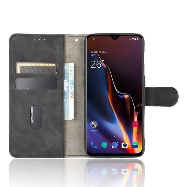 OnePlus 6T Solid Color Skin Feel Magnetic Buckle Horizontal Flip Calf Texture PU Leather Case with Holder & Card Slots & Wallet(Black)