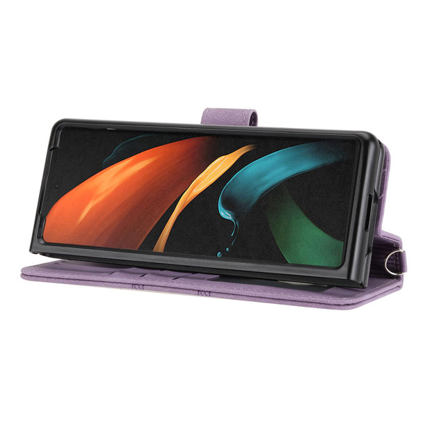 Samsung Galaxy Z Fold2 5G Embossed Striped Magnetic Buckle PU + TPU Horizontal Flip Phone Leather Case(Purple)