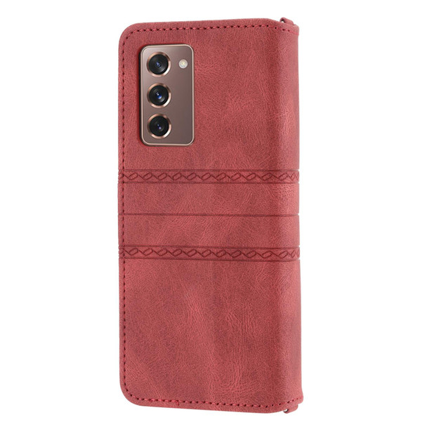 Samsung Galaxy Z Fold2 5G Embossed Striped Magnetic Buckle PU + TPU Horizontal Flip Phone Leather Case(Red)
