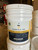 Stacked 5-gallon pails of SunShield Pro cool roof and wall coating for bulk orders