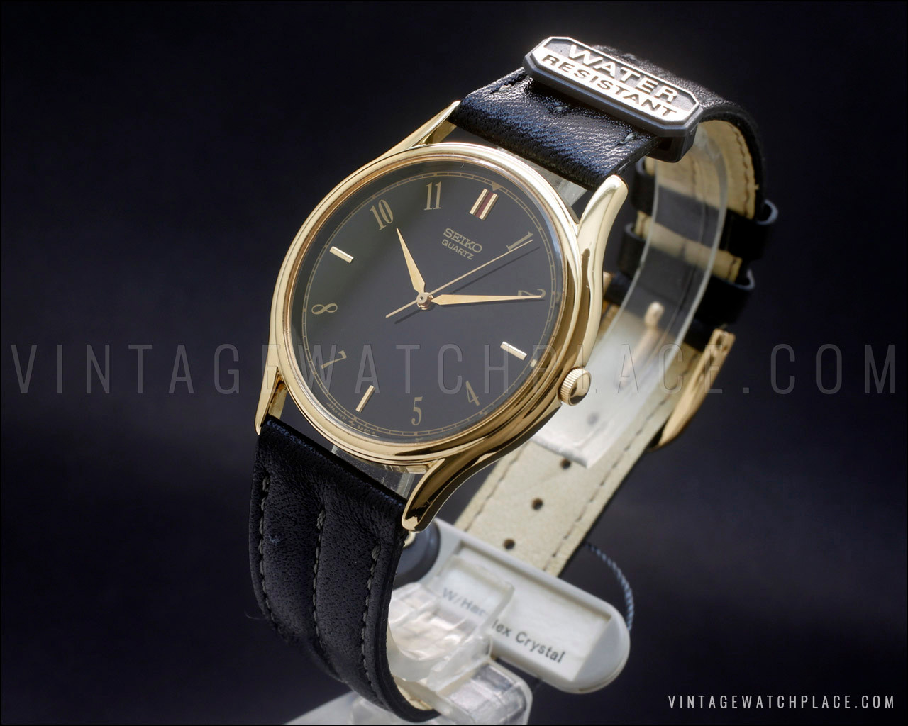 New Old Stock dress 1990 Seiko black dial with red marker at 12