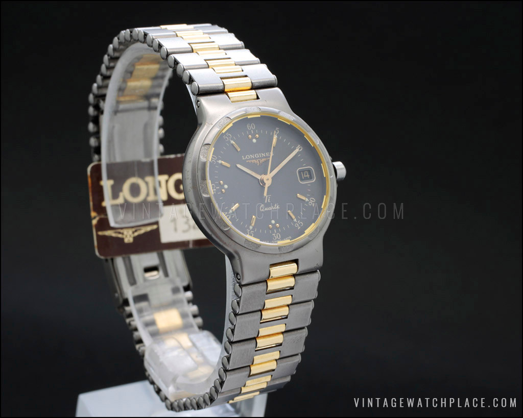 New Old Stock Ladies' Longines Conquest Titanium/gold quartz, with