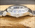 Crown-side view of the 1979 Timex Viscount automatic, with the case profile, crown and polished bezel visible.