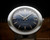 Close-up of the blue dial on the Timex Viscount 34318 10879, with applied hour markers, date display and automatic signature.