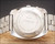 Caseback view of the Sakay 61365A automatic watch, marked stainless steel, waterproof, shock-protected, antimagnetic and automatic.
