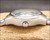 Crown-side profile of the Osman 2378W3 NOS automatic, showing the stainless steel case, original crown, domed crystal and bracelet connection.