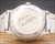 Caseback view of the Osman automatic watch, showing the stainless steel back, original bracelet and vintage price sticker.