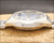 Side profile of the Osman 982 vintage automatic watch, highlighting the stainless steel case, faceted Plexiglas crystal and 1970s case proportions.
