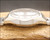 Side profile of the Osman 982 vintage automatic watch, highlighting the stainless steel case, faceted Plexiglas crystal and 1970s case proportions.