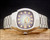Front display of the Osman NS6633 NOS automatic watch, showing the full stainless steel bracelet, purple-green dial layout and day-date calendar.