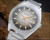 NOS Osman vintage mechanical watch in stainless steel, with brown fumé dial, day-date calendar, raised gold-tone indexes and original steel bracelet.