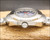Crown-side profile of the Osman NOS automatic watch, showing the original crown, polished case flank and original crystal.