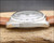 Side profile of the Stelwatch vintage automatic watch, highlighting the all-stainless-steel case, original Plexiglas crystal and 1970s case proportions.
