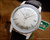 NOS Radar automatic vintage watch in stainless steel, with perfect silver dial, applied indexes, date window and brand new black Italian leather strap.
