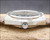Crown-side profile of the Tecnal automatic watch, showing the original crown, angular case, mineral crystal and Portuguese market hallmark near the crown.