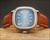 Front display of the Tecnal automatic vintage watch, highlighting the blue dial, 30 rubis text, Antichoc marking and distinctive cushion-shaped case.