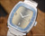NOS Tecnal automatic vintage watch with two-tone champagne and blue dial, 22-rubis marking, date window, square 1970s case and vintage bracelet.