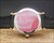 
Original stainless steel caseback of the Zenith NOS Time Capsule watch, retaining its red protective coating and engraved reference 27.0060.315.
