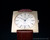 Cyma Chambord new old stock Square mechanical vintage watch, NOS, golden dial, gold plated, signed crown, original strap