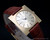 New Old Stock Cyma Chambord Square mechanical vintage watch, NOS, golden dial, gold plated, signed crown, original strap