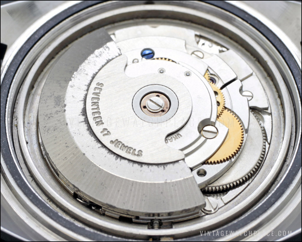 Swiss made New Old Stock Titan automatic vintage watch, ETA 2783 movement,  light brown dial, C shape, all stainless steel.