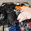 749 units of Clothing & Accessories - MSRP $10,578 - Returns (Lot # 679926)