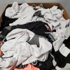 477 units of Clothing & Accessories - MSRP $8,557 - Returns (Lot # 690429)