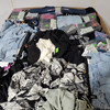 1052 units of Clothing & Accessories - MSRP $16,352 - Returns (Lot # 842423)